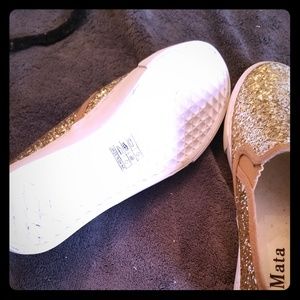 Gold slip ons